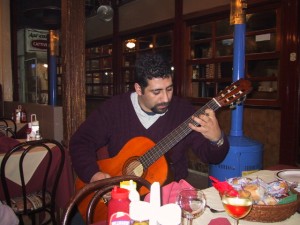 Photo of our guide playing a guitar